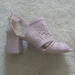 Women's size 8.5 tan colored heels.